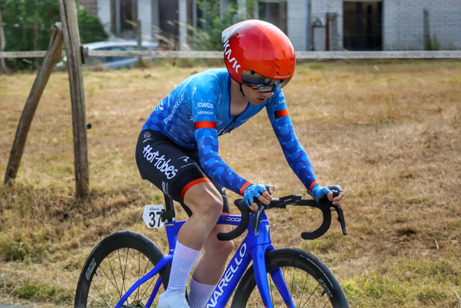 Devin riding in blue Hot Tubes kit and a red helmet